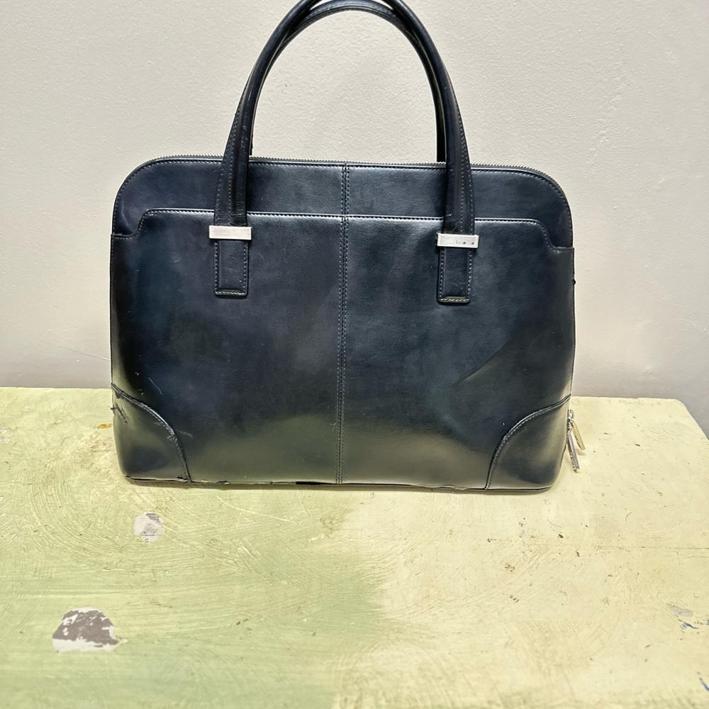 Rubi knomo lap top/brief case quilted inside normal wear preowned